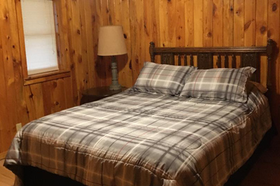 Comfortable sleeping accommodations at Paradise Cabin
