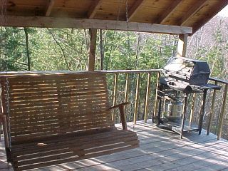 The View cabin swing and bbq on deck