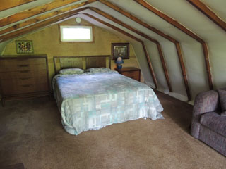 The Cottage cabin loft bedroom