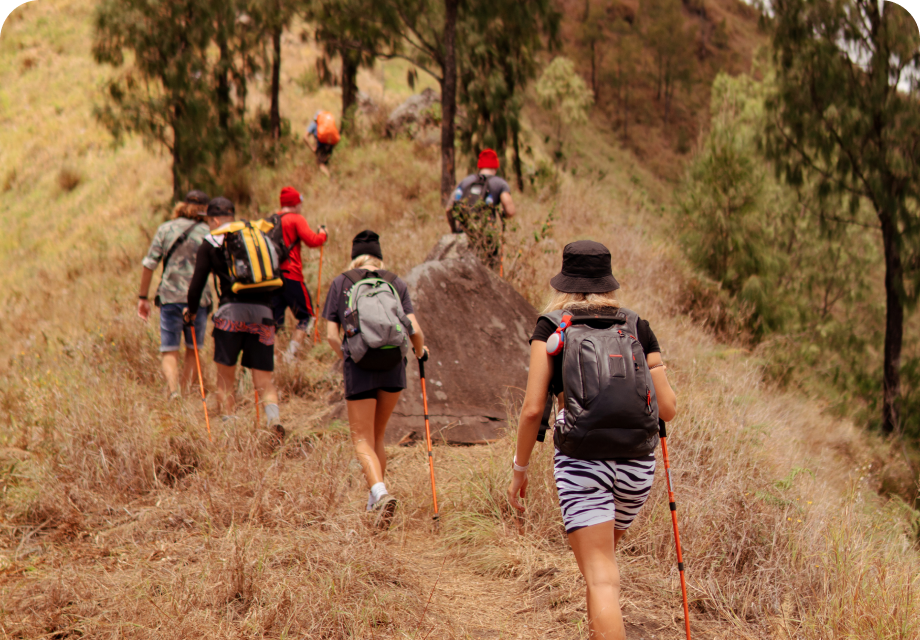 Group hiking on hill