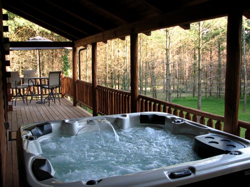 Hot and Bubbly Hot Tub at The Merlot Log Cabin Getaway